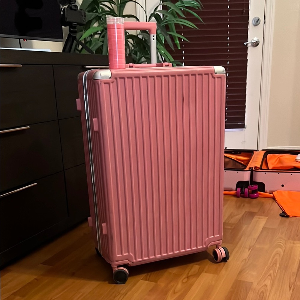 AnyZip Pink No-Zip Hardshell Travel Swivel Trunk